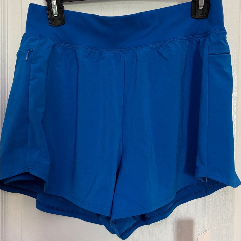 NWT CRZ YOGA Sports Shorts Blue Sz L/12 Side Zip Lined with Stretch Shorts